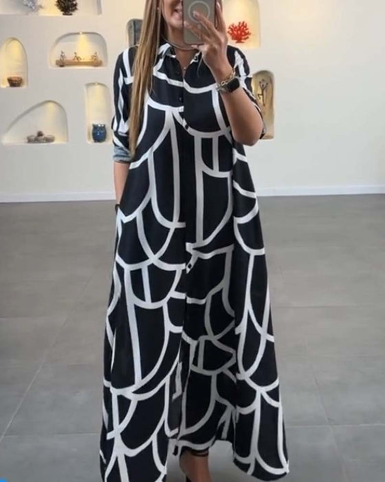 Jurk met lange split en revers met contrasterende print