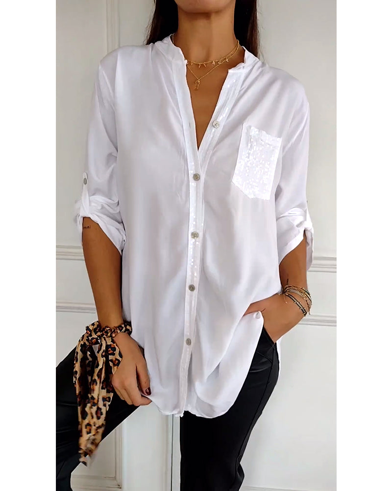Casual top met knopen en pailletten