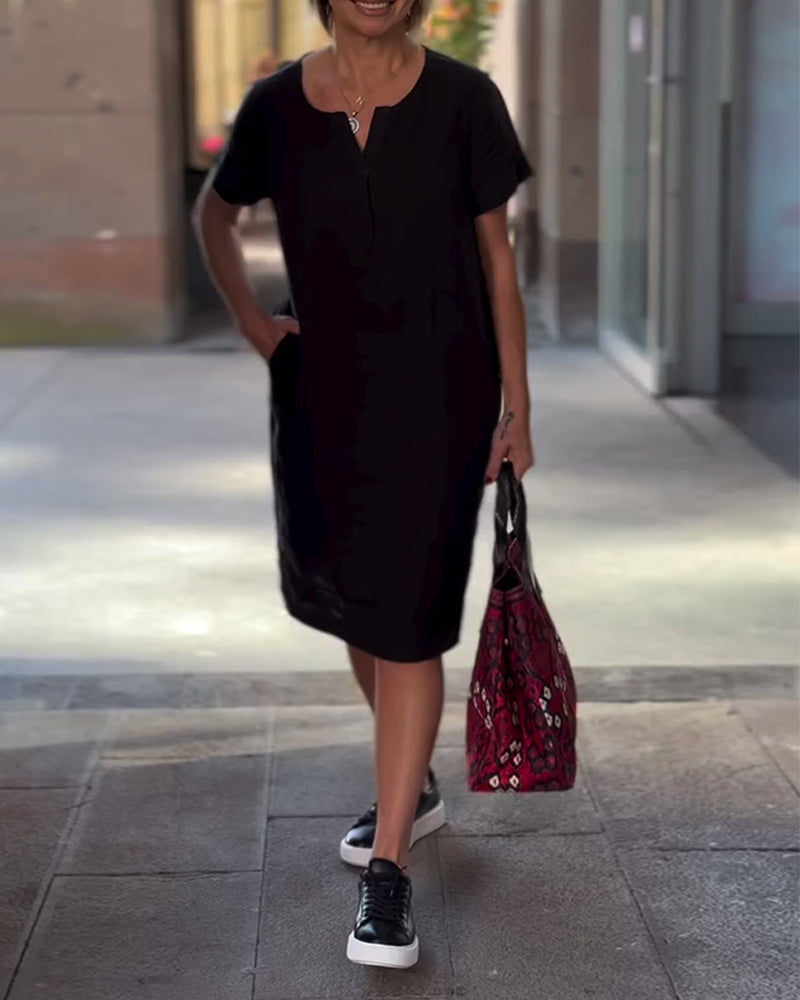 Effen jurk met V-hals en korte mouwen en zak