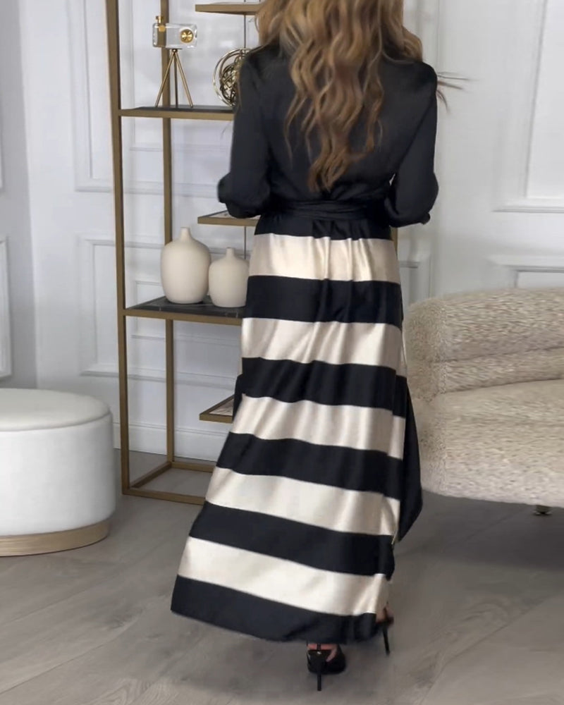 Elegante gestreepte bedrukte jurk met revers en band