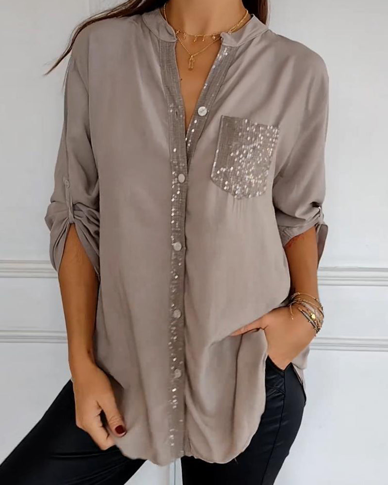 Casual top met knopen en pailletten