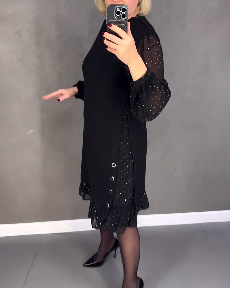 Elegante jurk met lange mouwen en stippen