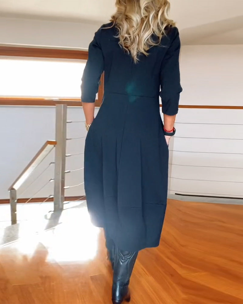 Elegante effen jurk met ronde hals en zak