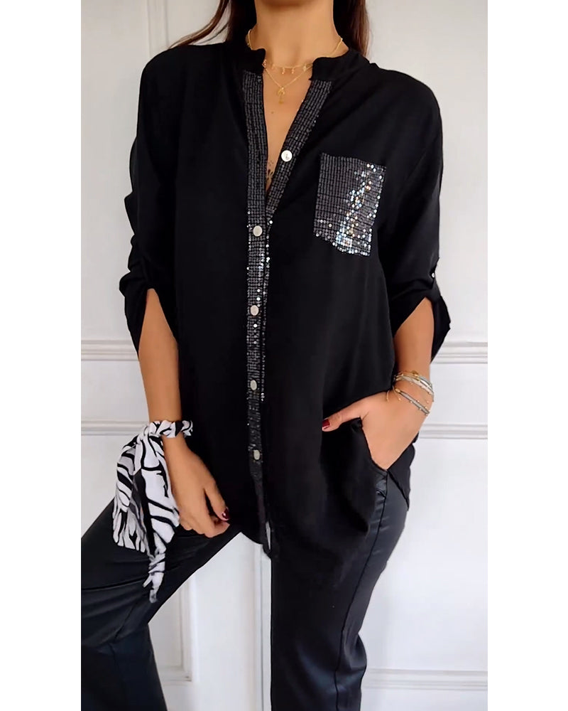 Casual top met knopen en pailletten