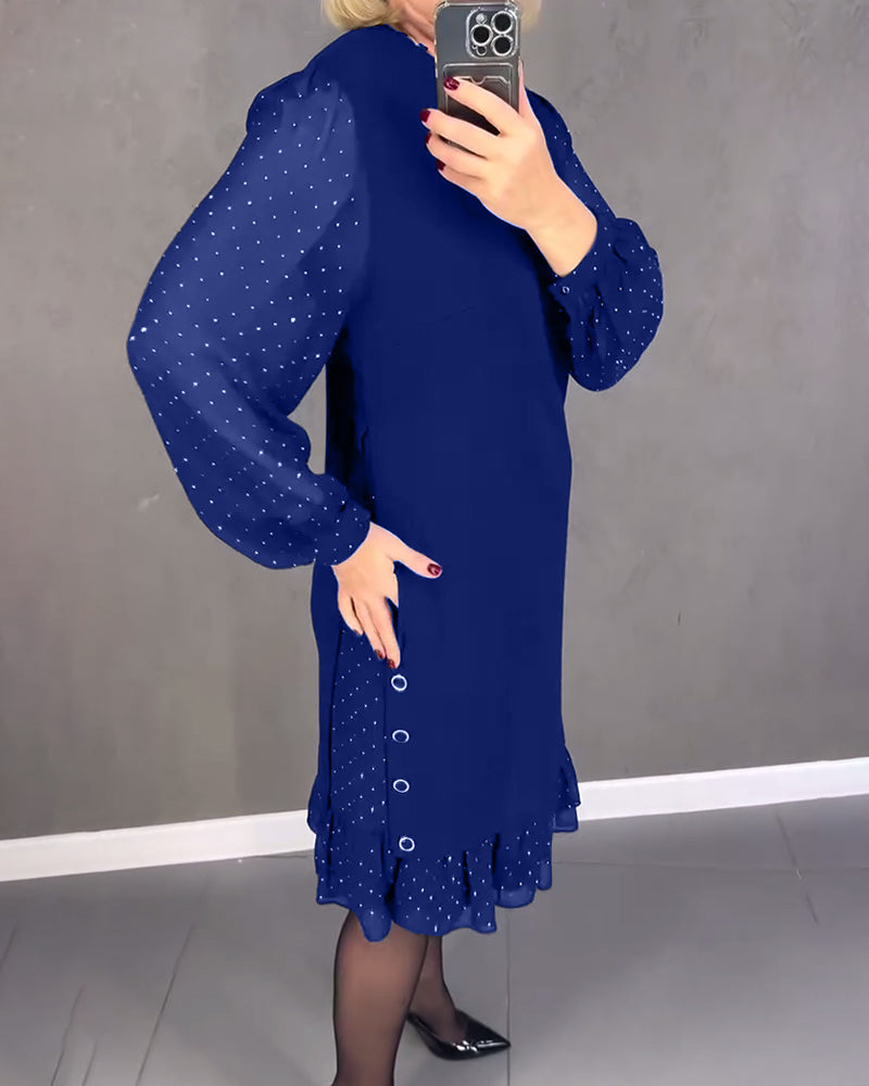Elegante jurk met lange mouwen en stippen