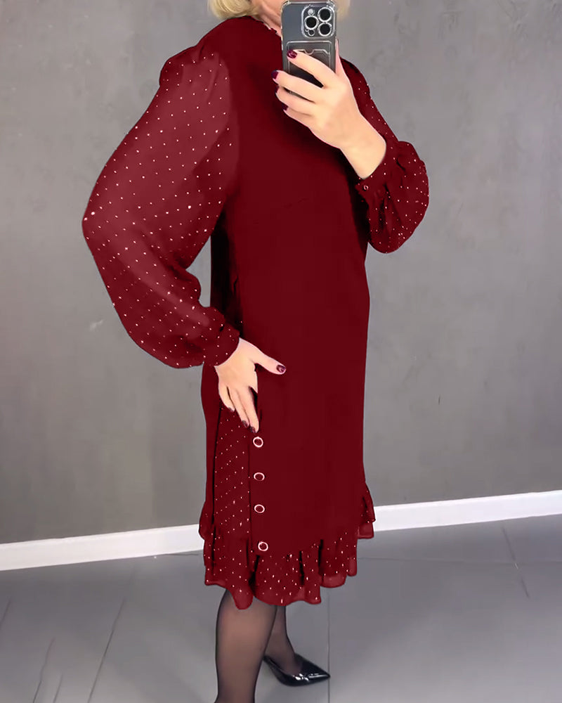 Elegante jurk met lange mouwen en stippen