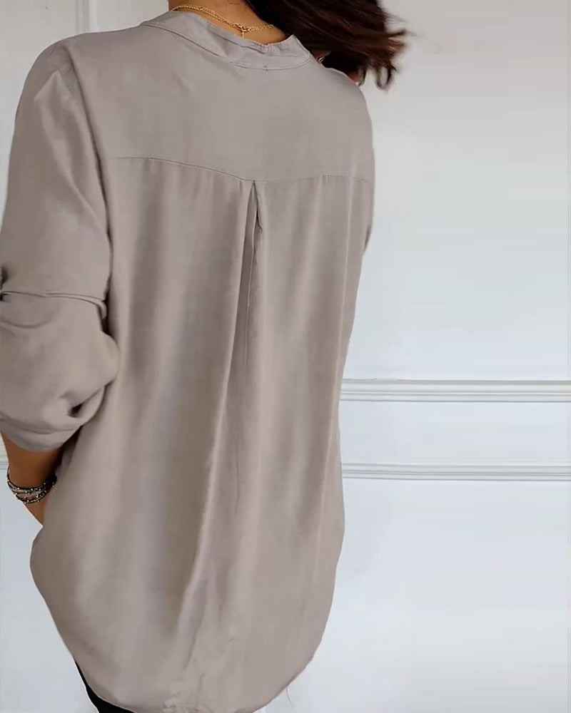 Casual top met knopen en pailletten