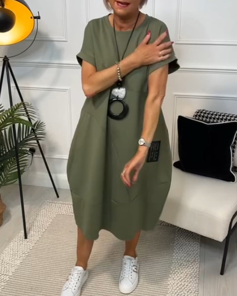 Eenvoudige casual jurk met korte mouwen en letterprint