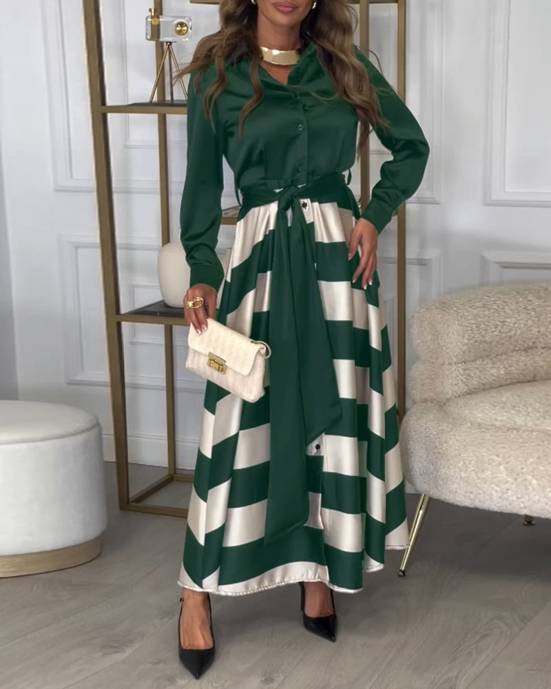 Elegante gestreepte bedrukte jurk met revers en band