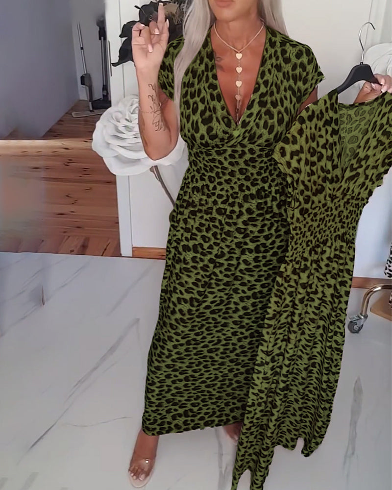 Elegante jurk met luipaardprint en v-hals