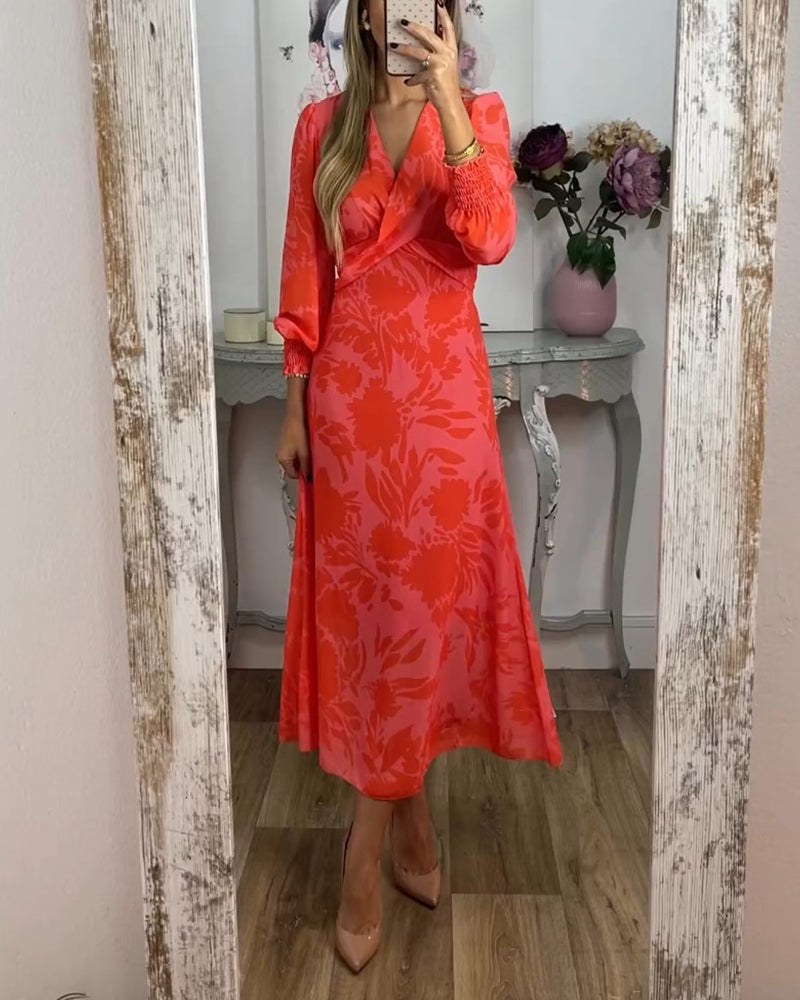 Jurk met V-hals en geknipte taille