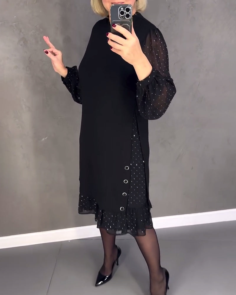 Elegante jurk met lange mouwen en stippen