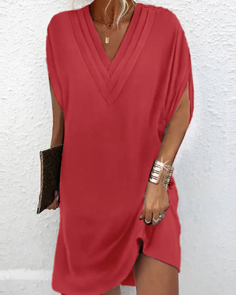 Elegante jurk met splitmouwen in effen kleur