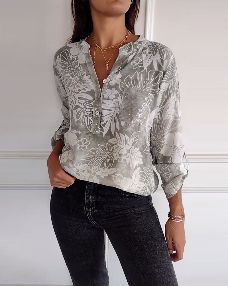 Top met bladprint en patchwork-pailletten
