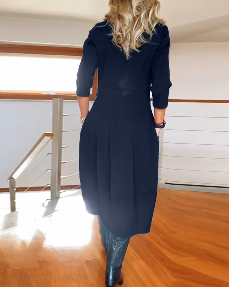 Elegante effen jurk met ronde hals en zak