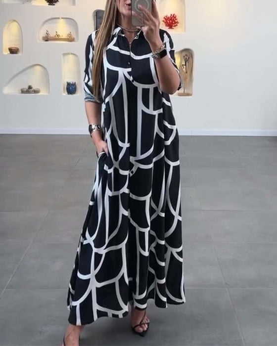 Jurk met lange split en revers met contrasterende print