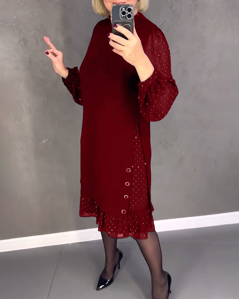 Elegante jurk met lange mouwen en stippen
