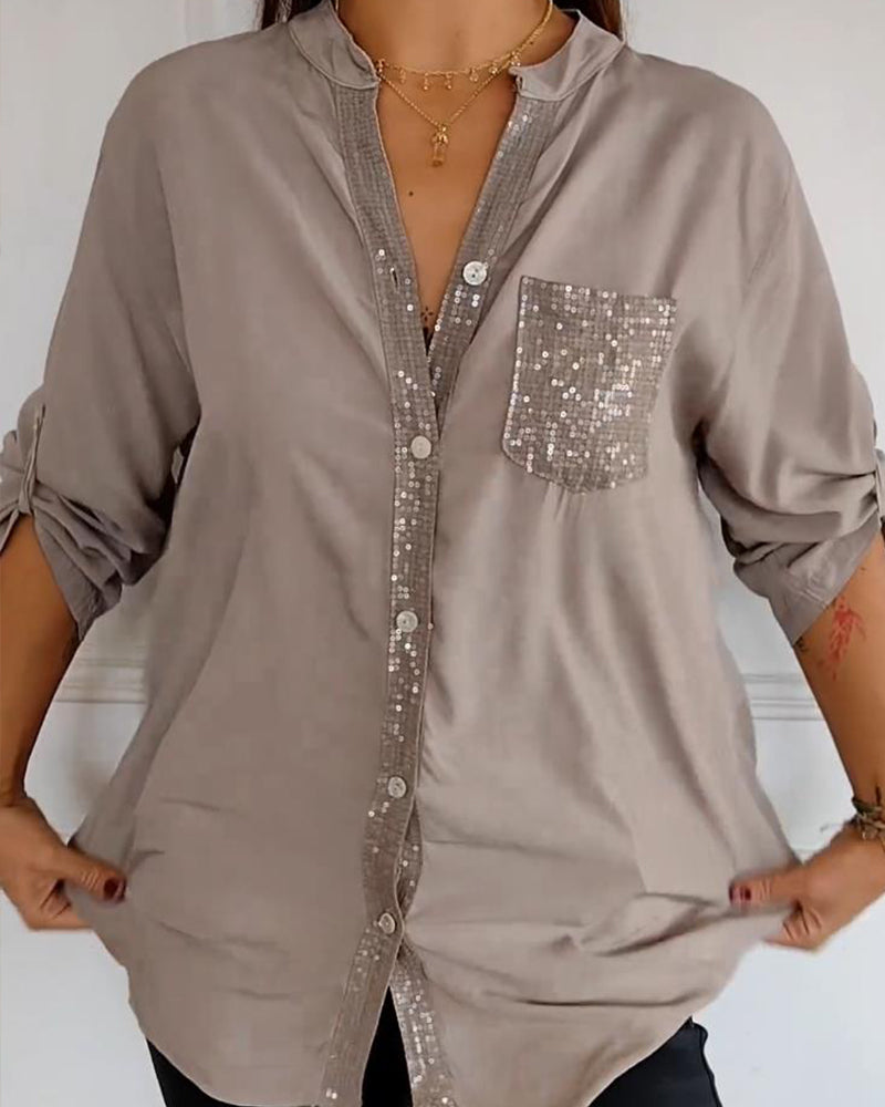 Casual top met knopen en pailletten