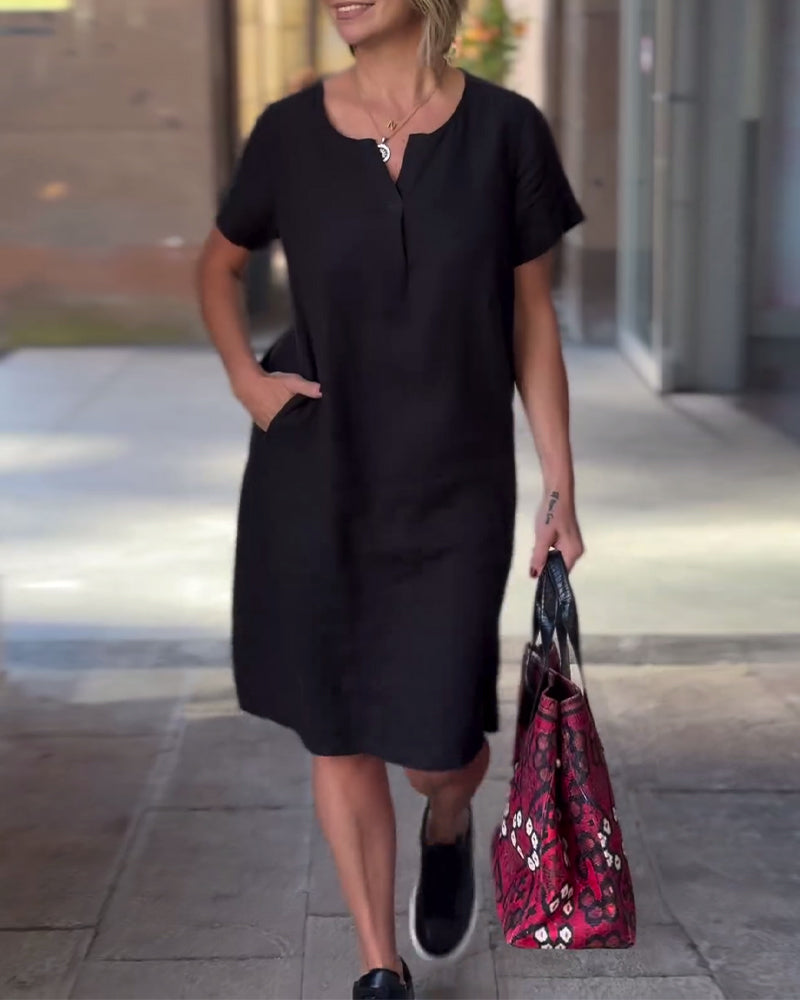 Effen jurk met V-hals en korte mouwen en zak