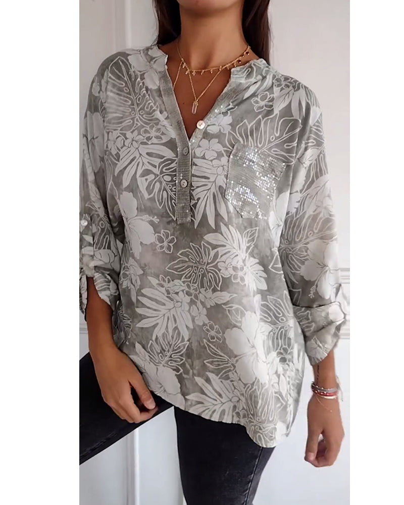 Top met bladprint en patchwork-pailletten
