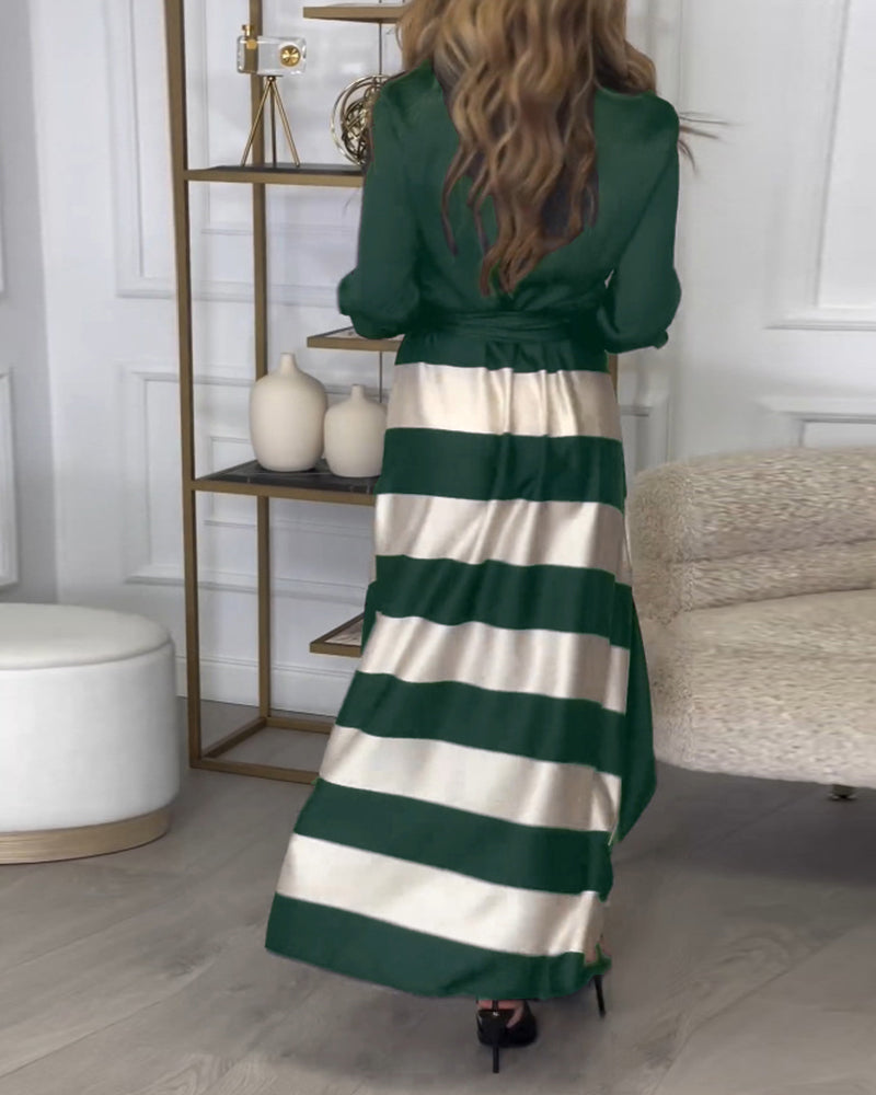 Elegante gestreepte bedrukte jurk met revers en band