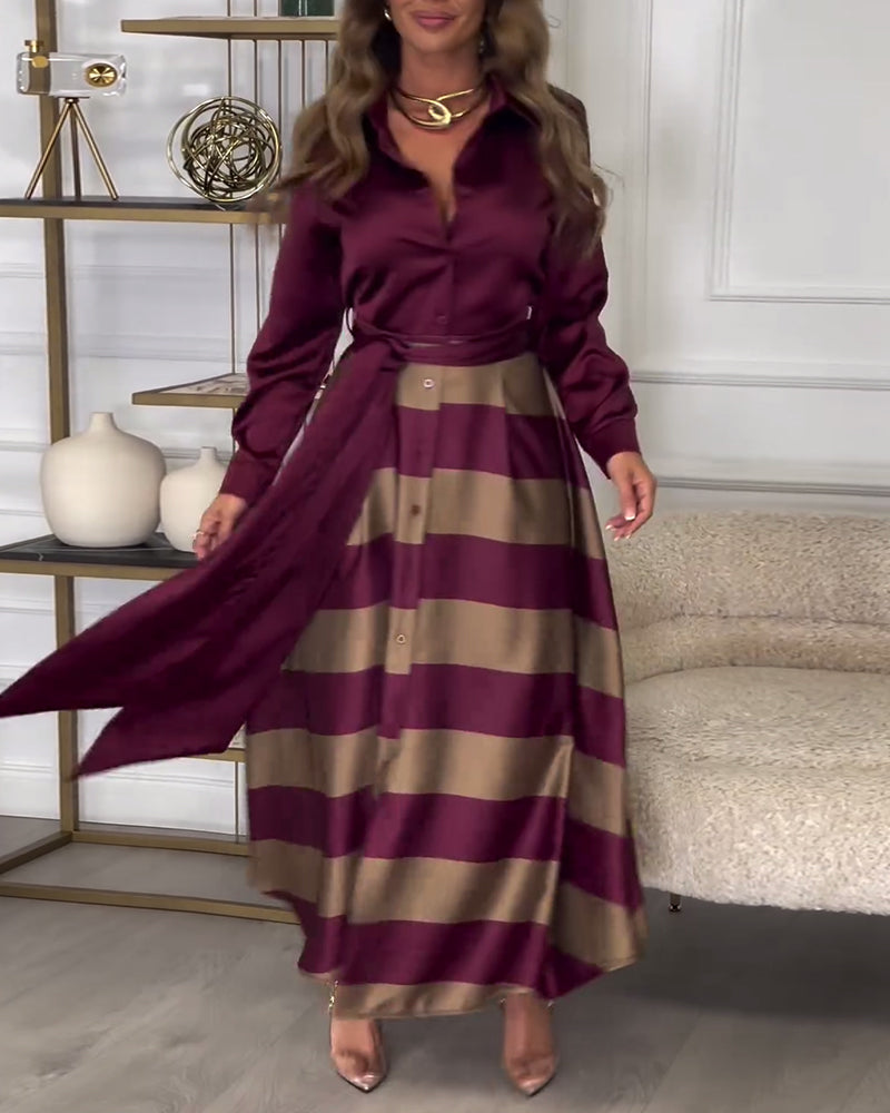 Elegante gestreepte bedrukte jurk met revers en band