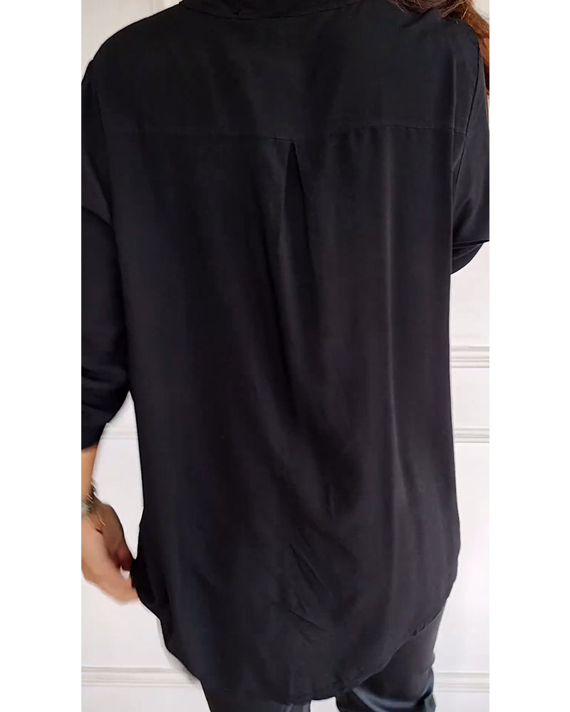 Casual top met knopen en pailletten