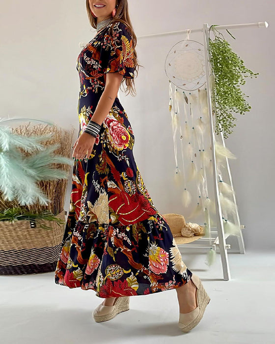 Elegante jurk met V-hals en korte mouwen met print