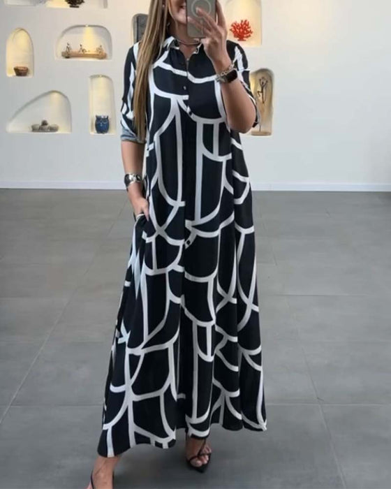 Jurk met lange split en revers met contrasterende print