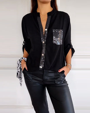 Casual top met knopen en pailletten