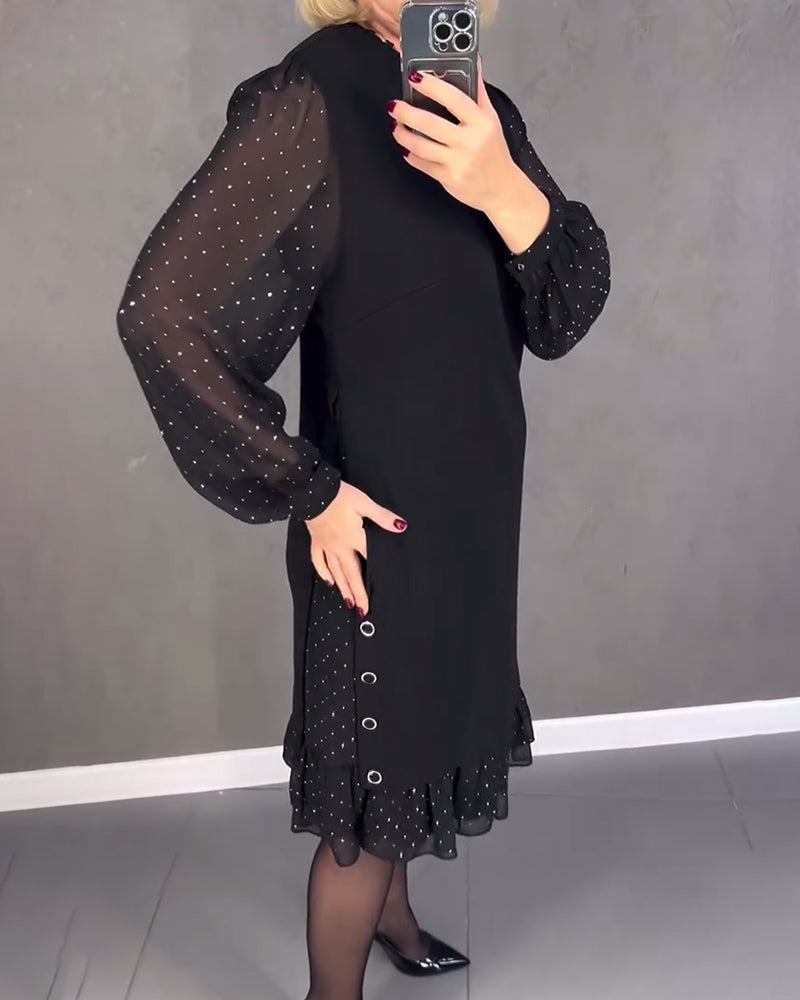 Elegante jurk met lange mouwen en stippen