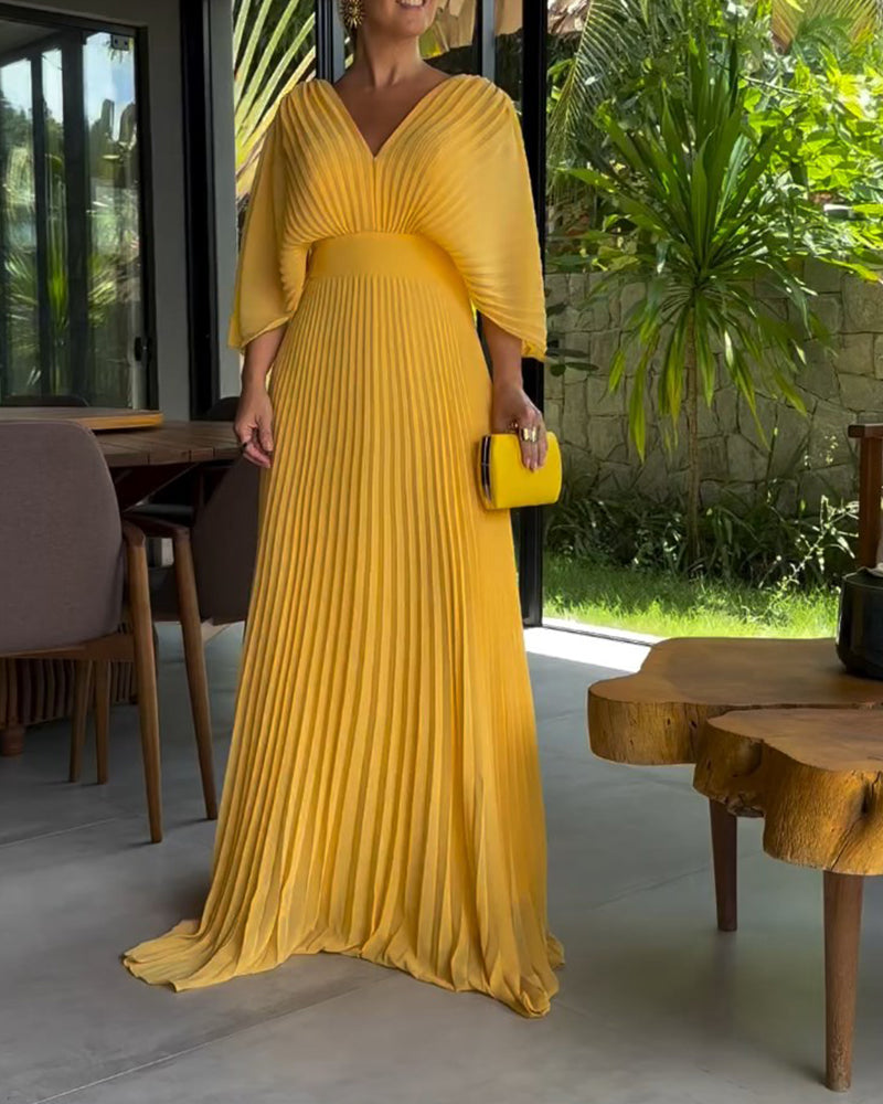 Jurk met plooien en ingesnoerde taille