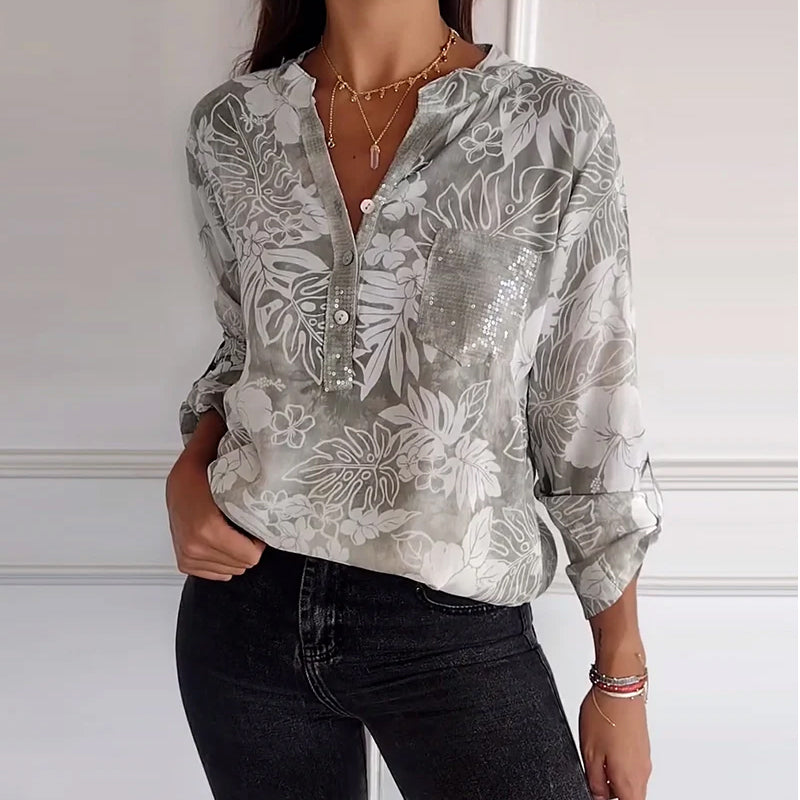 Top met bladprint en patchwork-pailletten
