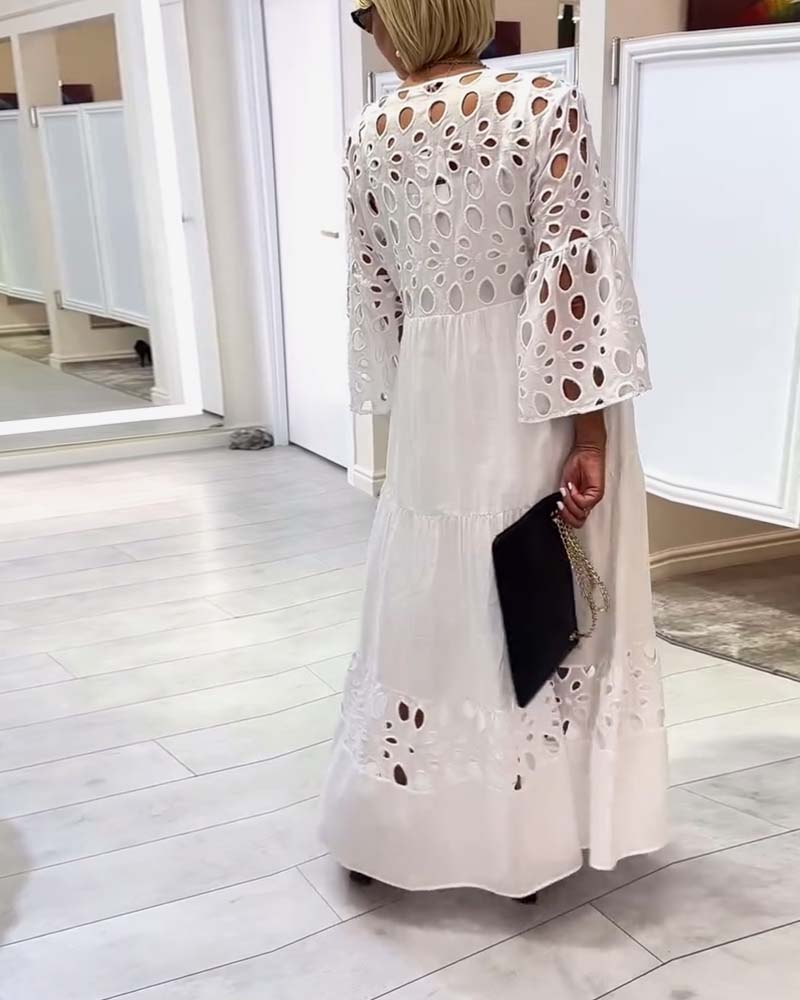Elegante effen jurk met kanten gat