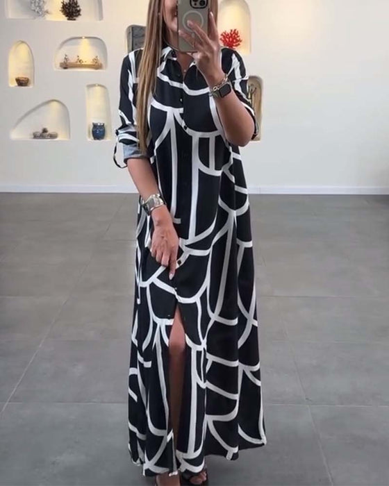Jurk met lange split en revers met contrasterende print