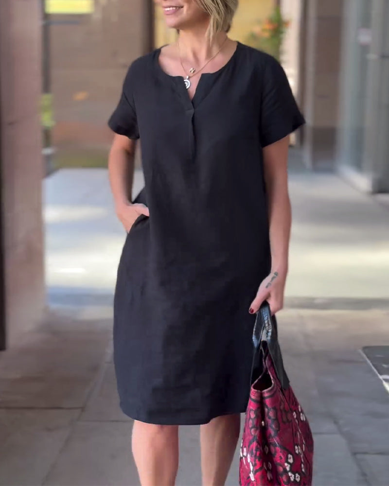 Effen jurk met V-hals en korte mouwen en zak