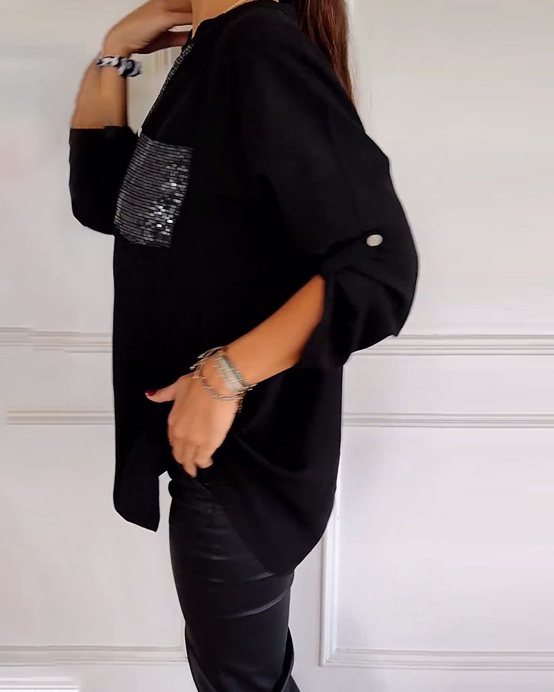 Casual top met knopen en pailletten