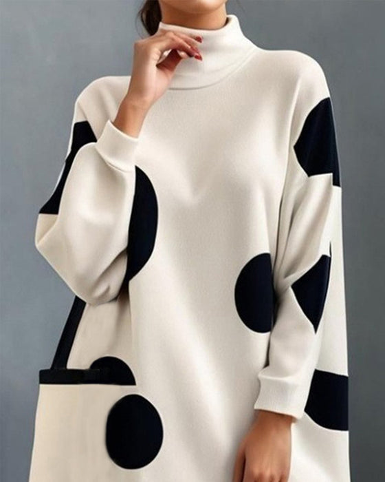 Elegante polkadot losse jurk met hoge hals zak