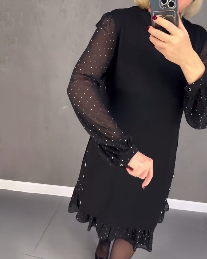 Elegante jurk met lange mouwen en stippen