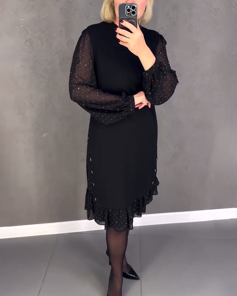 Elegante jurk met lange mouwen en stippen