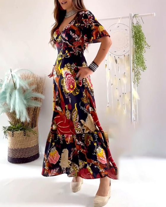 Elegante jurk met V-hals en korte mouwen met print