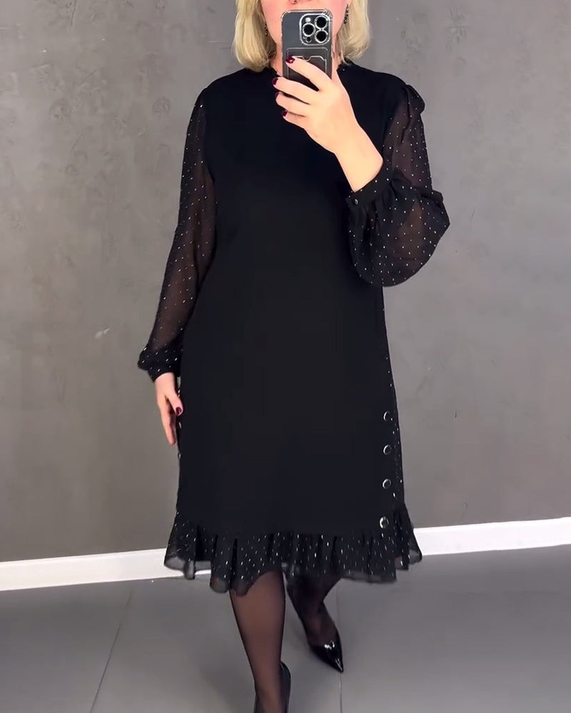 Elegante jurk met lange mouwen en stippen