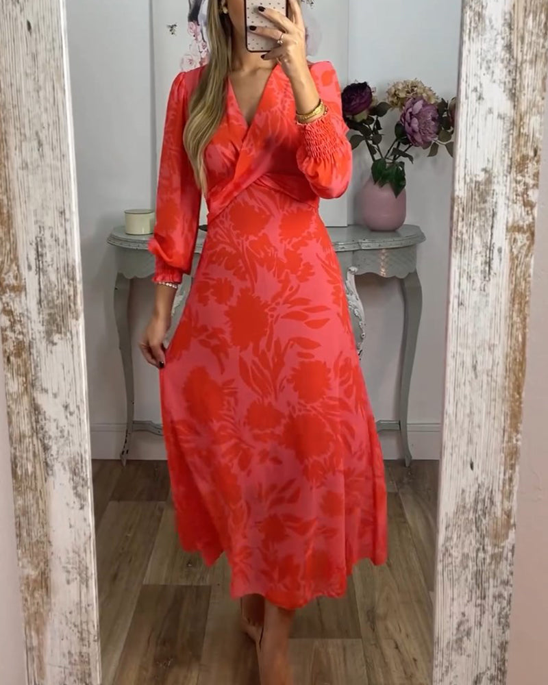 Jurk met V-hals en geknipte taille