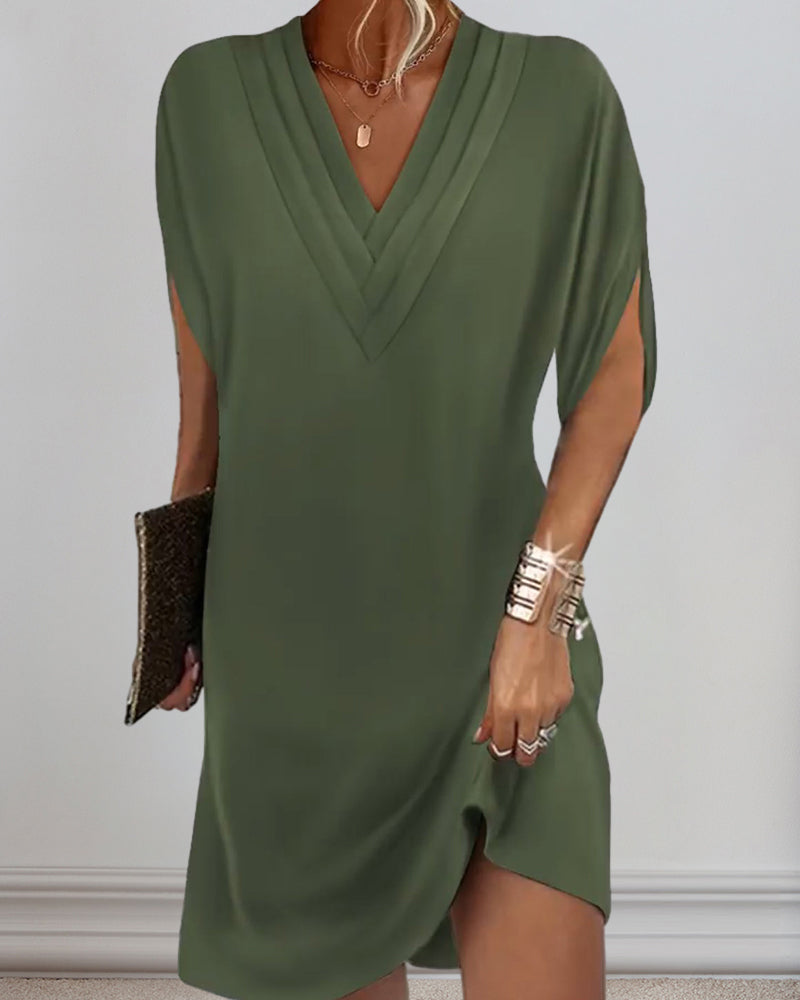 Elegante jurk met splitmouwen in effen kleur