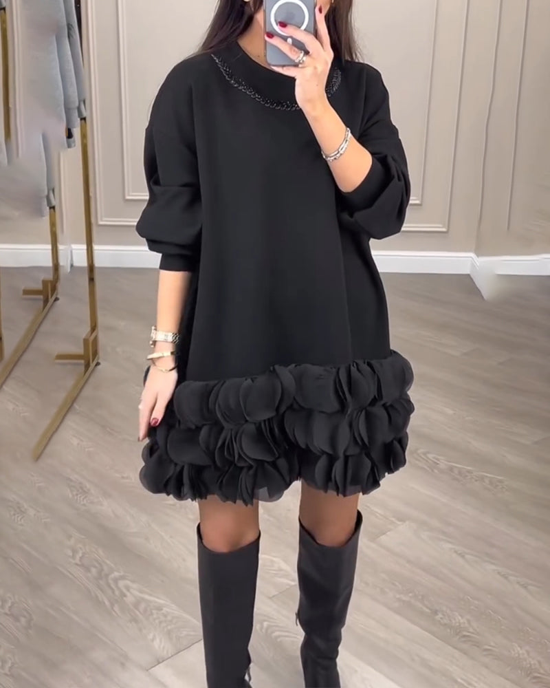 Elegante jurk met patchwork bloemblaadjes