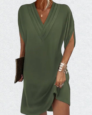 Elegante jurk met splitmouwen in effen kleur
