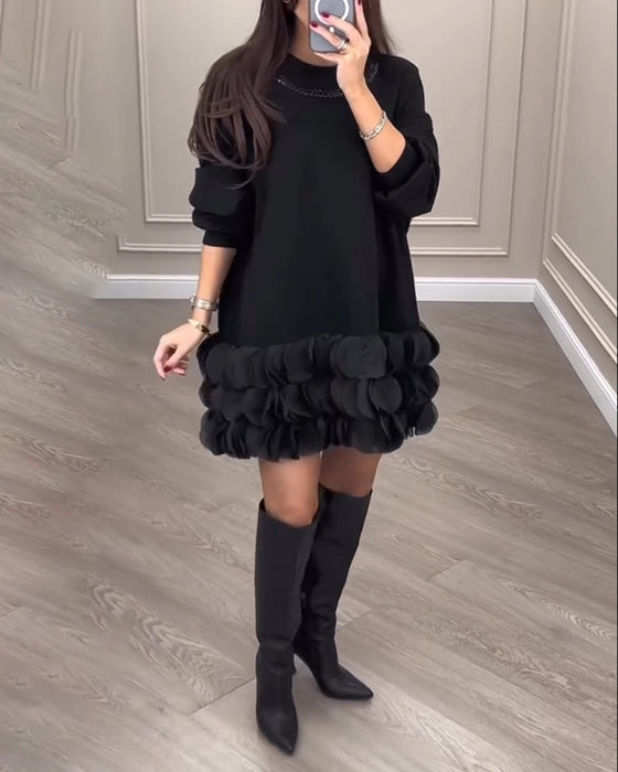 Elegante jurk met patchwork bloemblaadjes