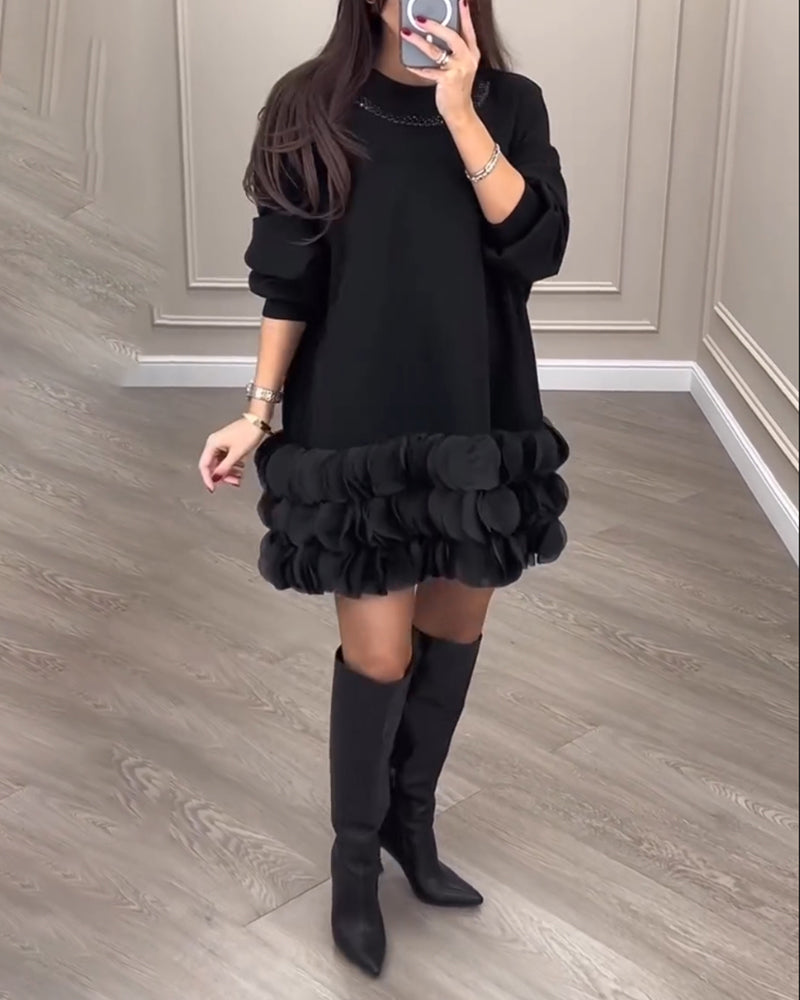 Elegante jurk met patchwork bloemblaadjes