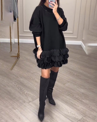 Elegante jurk met patchwork bloemblaadjes