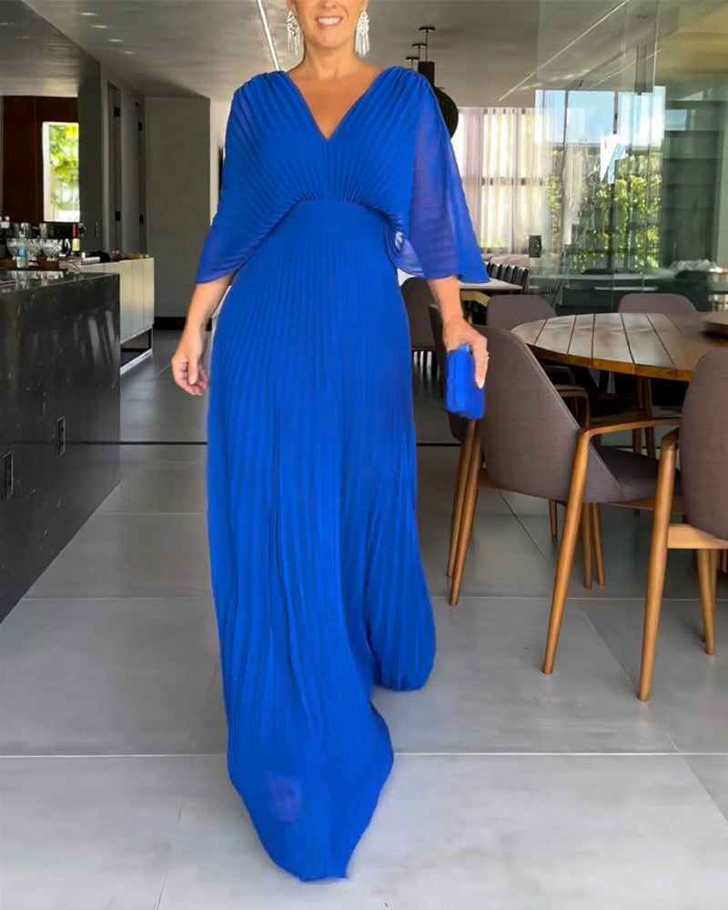 Jurk met plooien en ingesnoerde taille
